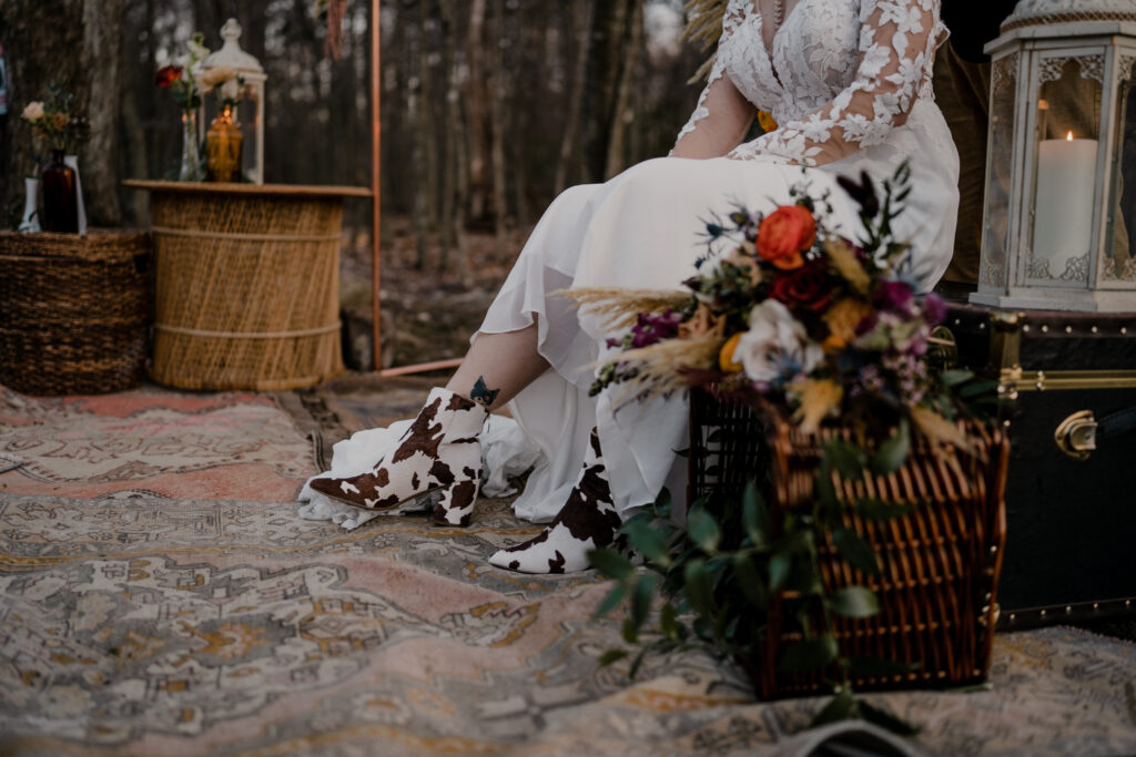 Woman with cowboy boots at her wedding elopement